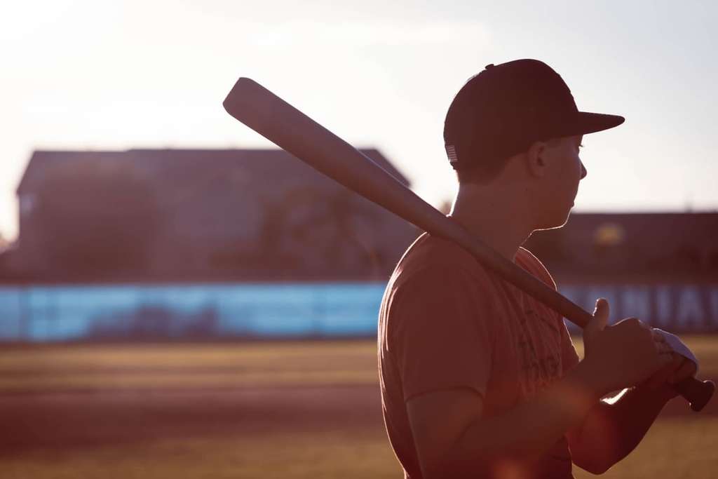 boy holding baseball bat