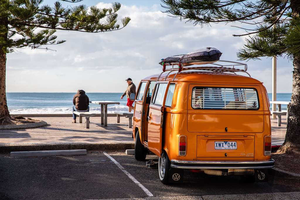 orange van by water