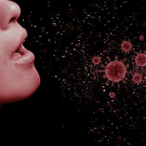 Woman with tuberculosis coughing