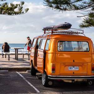 orange van by water