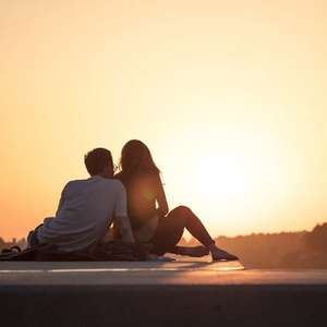 A couple watching the sunset