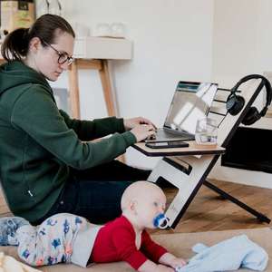 woman working from home with baby