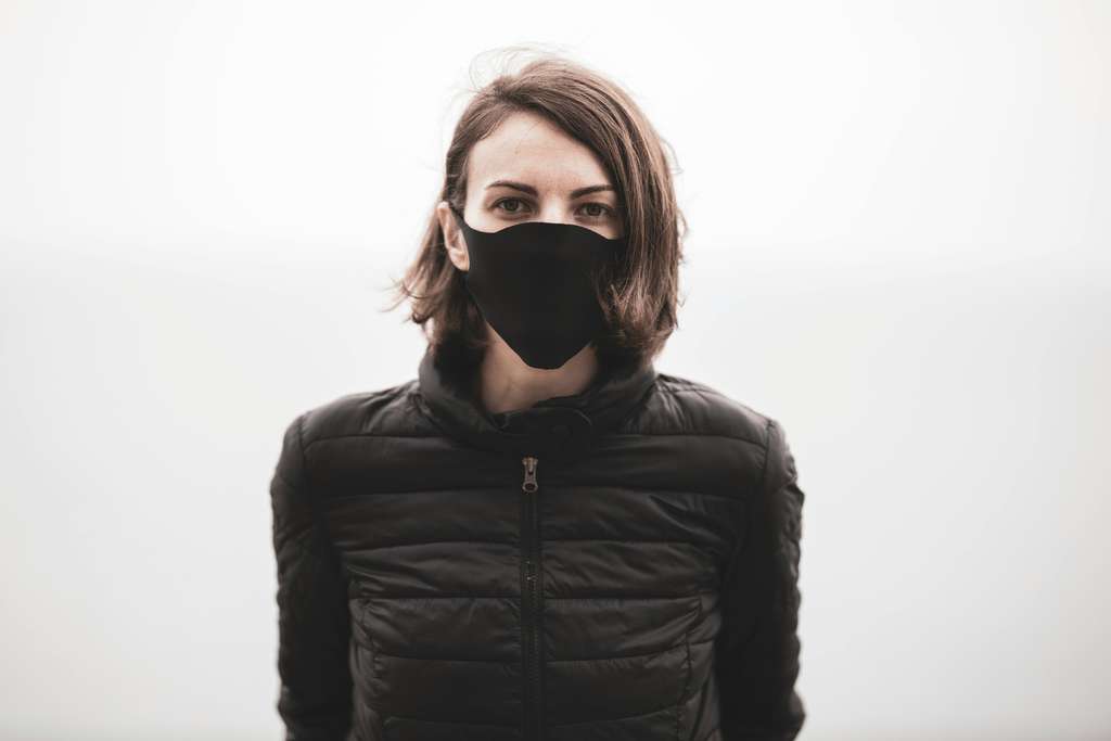 woman wearing a mask