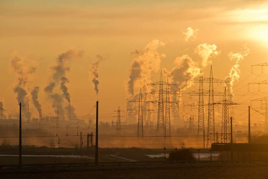 Factories releasing smoke and causing air pollution