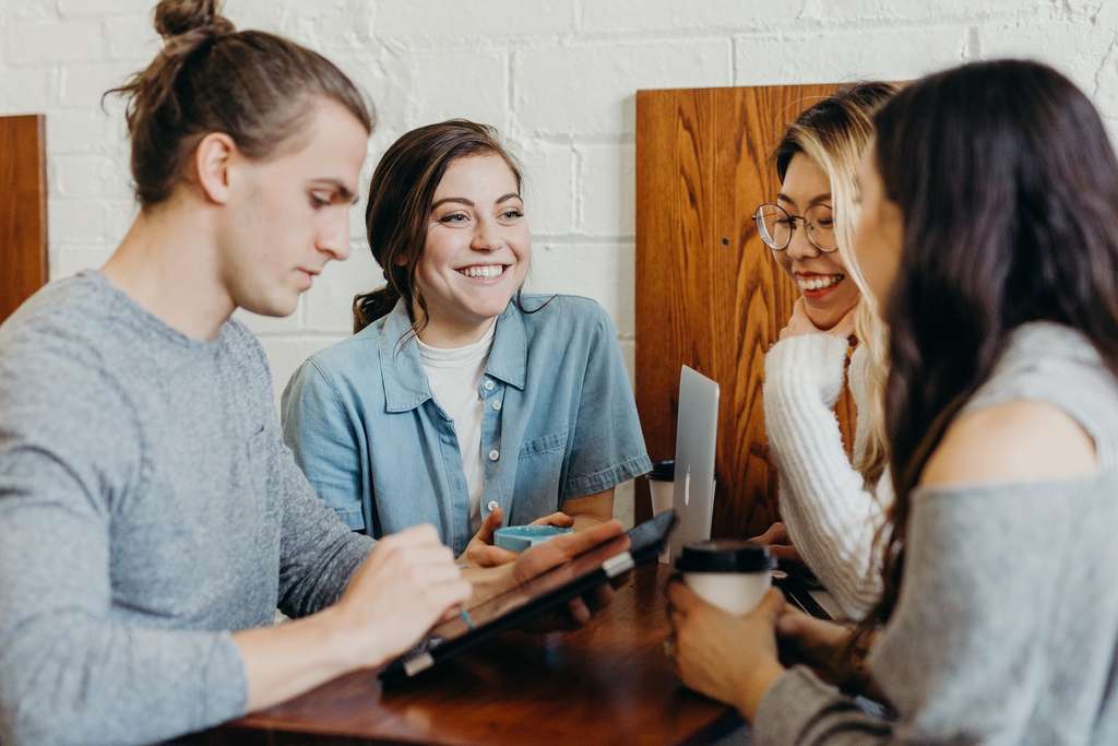 Group of college students studying