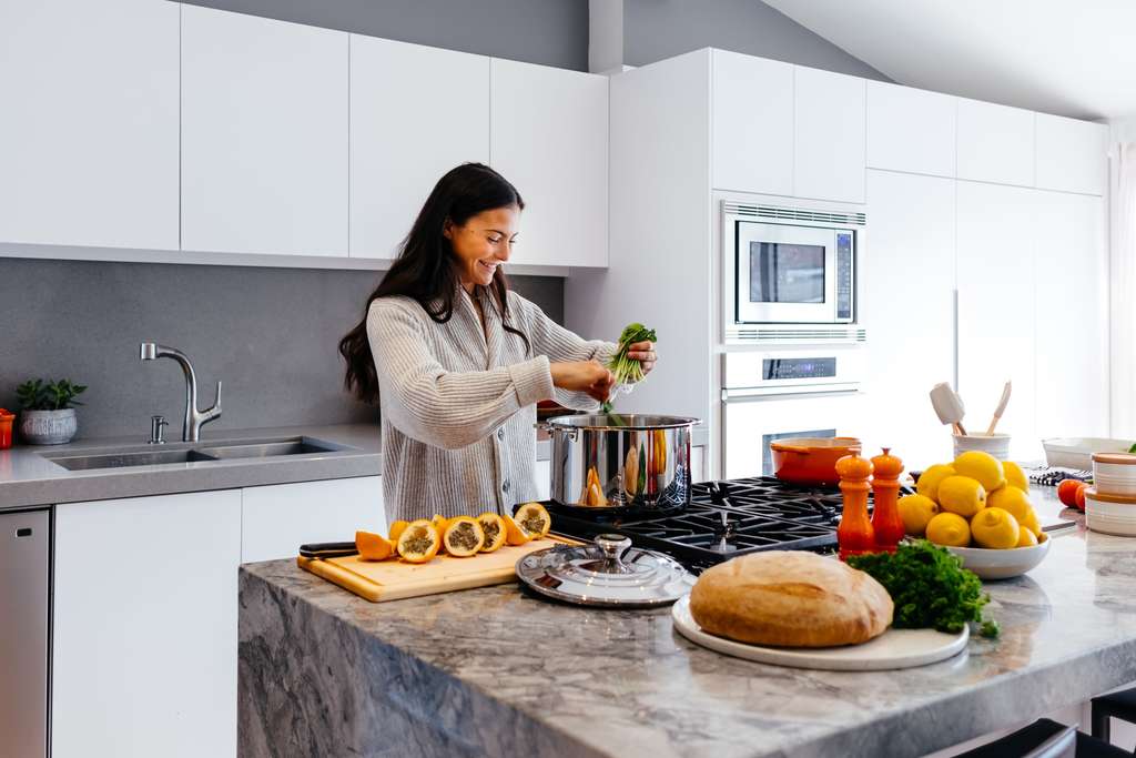 Woman cooking vegetables